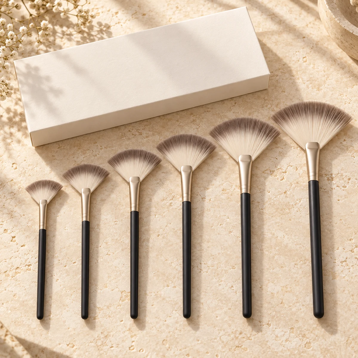 Noir Studio Six Fan Highlight Brush Set — Charcoal handle / taupe-tipped ivory bristles fan highlight brush design