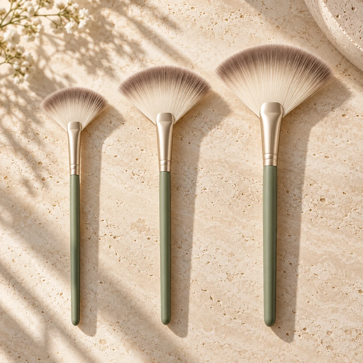 Sauge Sculpt Trio Fan Highlight Brush Set — Sage handle / taupe-tipped ivory bristles fan highlight brush design